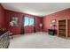 Spacious primary bedroom featuring plush carpet and an abundance of natural light from a large window at 8806 Tuscany Ln, Highlands Ranch, CO 80130