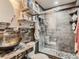 A remodeled bathroom features a mosaic backsplash, glass shower, and vessel sink at 3081 W 18Th Ave, Denver, CO 80204