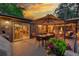 Spacious back deck with outdoor seating, dining area, and ambient lighting for relaxing evenings at 20520 E Regency Way, Parker, CO 80138