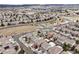 Aerial view of home's location in the neighborhood, near community clubhouse and pool at 2418 Coach House Loop, Castle Rock, CO 80109