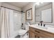 Modern bathroom featuring updated vanity, shower-tub, and stylish decor at 2418 Coach House Loop, Castle Rock, CO 80109