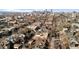 Aerial view showcasing the neighborhood and city skyline in the background at 55 S Grant St, Denver, CO 80209