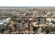 Urban aerial view showcasing neighborhood streets, residential houses, and city buildings at 55 S Grant St, Denver, CO 80209