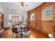 Charming dining area with wood floors, brick accent wall, and stylish table set at 55 S Grant St, Denver, CO 80209