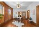 Bright dining room with hardwood floors, exposed brick, and modern furnishings at 55 S Grant St, Denver, CO 80209