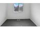 Simple bedroom with gray carpet and a window at 5599 W 115Th Ave, Westminster, CO 80020