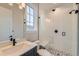 Modern bathroom with a walk-in shower at 1853 Hickory Ave, Erie, CO 80516