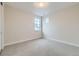 Spacious bedroom with neutral decor and carpet at 1853 Hickory Ave, Erie, CO 80516