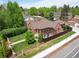 Aerial view of a beautiful property highlighting the home's landscaping, patio, and neighborhood at 2300 Jasmine St, Denver, CO 80207