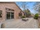 Spacious back deck featuring stylish furniture with beautiful landscaping at 15846 W Bayaud Dr, Golden, CO 80401