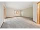 Carpeted bedroom with a window, offering a comfortable and serene space for relaxation and rest at 15846 W Bayaud Dr, Golden, CO 80401