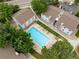 Aerial view of complex showing pool, landscaping, and buildings at 13404 E Jewell Ave # 101, Aurora, CO 80012