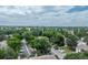 Desirable neighborhood aerial view, showcasing mature trees, landscaping and nearby amenities at 13404 E Jewell Ave # 101, Aurora, CO 80012