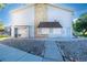 Exterior view of building with stone accents and mailboxes at 13404 E Jewell Ave # 101, Aurora, CO 80012
