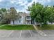 Charming two-story condo featuring dual balconies, a stone chimney and convenient parking at 13404 E Jewell Ave # 101, Aurora, CO 80012
