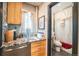Granite counters and a stylish window highlight this bright kitchen at 1365 N Corona St # 11, Denver, CO 80218