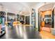 Open concept with hardwood floors, archways connecting living, dining and kitchen areas in this stylish condo at 1365 N Corona St # 11, Denver, CO 80218