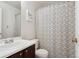 Small bathroom with shower/tub and patterned curtain at 8716 Starwood Ln, Parker, CO 80134