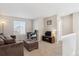 Cozy loft bedroom with window and TV at 8716 Starwood Ln, Parker, CO 80134