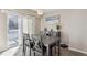 Dining area with table and chairs, near sliding door at 8716 Starwood Ln, Parker, CO 80134