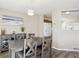 Open concept dining area with view of living room and kitchen at 8716 Starwood Ln, Parker, CO 80134