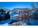 Two-story house with attached garage and front porch at 8716 Starwood Ln, Parker, CO 80134