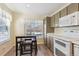 Eat-in kitchen featuring a breakfast nook and modern appliances at 8716 Starwood Ln, Parker, CO 80134