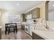 Bright kitchen with white appliances and ample cabinet space at 8716 Starwood Ln, Parker, CO 80134