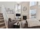 Spacious living room with fireplace and large windows at 8716 Starwood Ln, Parker, CO 80134