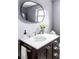 Stylish bathroom with a sleek vanity, modern fixtures, and a contemporary mirror at 365 Seminole Dr, Boulder, CO 80303