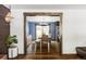 Open dining room with hardwood floors and modern lighting, seamlessly connected to the living room at 365 Seminole Dr, Boulder, CO 80303