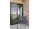 Cozy balcony space with black metal chair perfect for relaxing with an urban view at 460 S Marion Pkwy # 1701, Denver, CO 80209