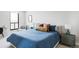 Cozy bedroom featuring a plush bed with colorful pillows and a serene atmosphere at 460 S Marion Pkwy # 1701, Denver, CO 80209