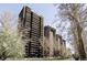 Stunning high-rise condo building showcases modern architecture and balcony views at 460 S Marion Pkwy # 1701, Denver, CO 80209