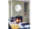 A warm fireplace with a decorative mirror and mantle creates a cozy atmosphere in the living space at 460 S Marion Pkwy # 1701, Denver, CO 80209