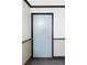 A classic light blue apartment door with black trim and gold hardware at 460 S Marion Pkwy # 1701, Denver, CO 80209
