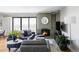 Inviting living room featuring a cozy fireplace, city views, and stylish contemporary decor at 460 S Marion Pkwy # 1701, Denver, CO 80209