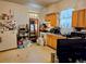 Kitchen features linoleum floors, wood cabinets, and plenty of counter space at 4316 Josephine St, Denver, CO 80216