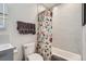 Clean bathroom with shower/tub combo at 3915 W Byron Pl, Denver, CO 80212