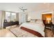 Bright bedroom with hardwood floors and large windows at 3915 W Byron Pl, Denver, CO 80212