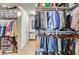 Large walk-in closet with ample hanging and shelving space at 3915 W Byron Pl, Denver, CO 80212