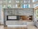 Modern fireplace with built-in shelving and a sleek design at 3915 W Byron Pl, Denver, CO 80212