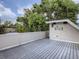 Private rooftop deck with composite wood flooring and outdoor speakers at 3915 W Byron Pl, Denver, CO 80212