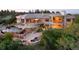 Expansive home boasts a custom pool, water features and stone detailing for the ultimate outdoor relaxation at 606 Cliffgate Ln, Castle Rock, CO 80108