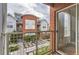 Tranquil view from the patio overlooking a well-maintained courtyard with a decorative landscape design at 85 Uinta Way # 702, Denver, CO 80230