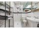 Updated bathroom featuring stylish subway tile shower and modern fixtures at 1301 N Ogden St # 1A, Denver, CO 80218