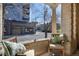 Charming porch with seating area, offering a relaxing outdoor space with views of the street at 1301 N Ogden St # 1A, Denver, CO 80218