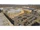 High-angle aerial view showcases a bustling area, revealing community layout and expansive parking facilities at 7240 W Custer Ave # 119, Lakewood, CO 80226
