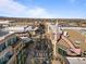 Detailed aerial view of a commercial district, showcasing its pedestrian friendly main street and vibrant atmosphere at 7240 W Custer Ave # 119, Lakewood, CO 80226
