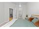 Bedroom featuring an inviting bed with stylish accent pillows at 7240 W Custer Ave # 119, Lakewood, CO 80226